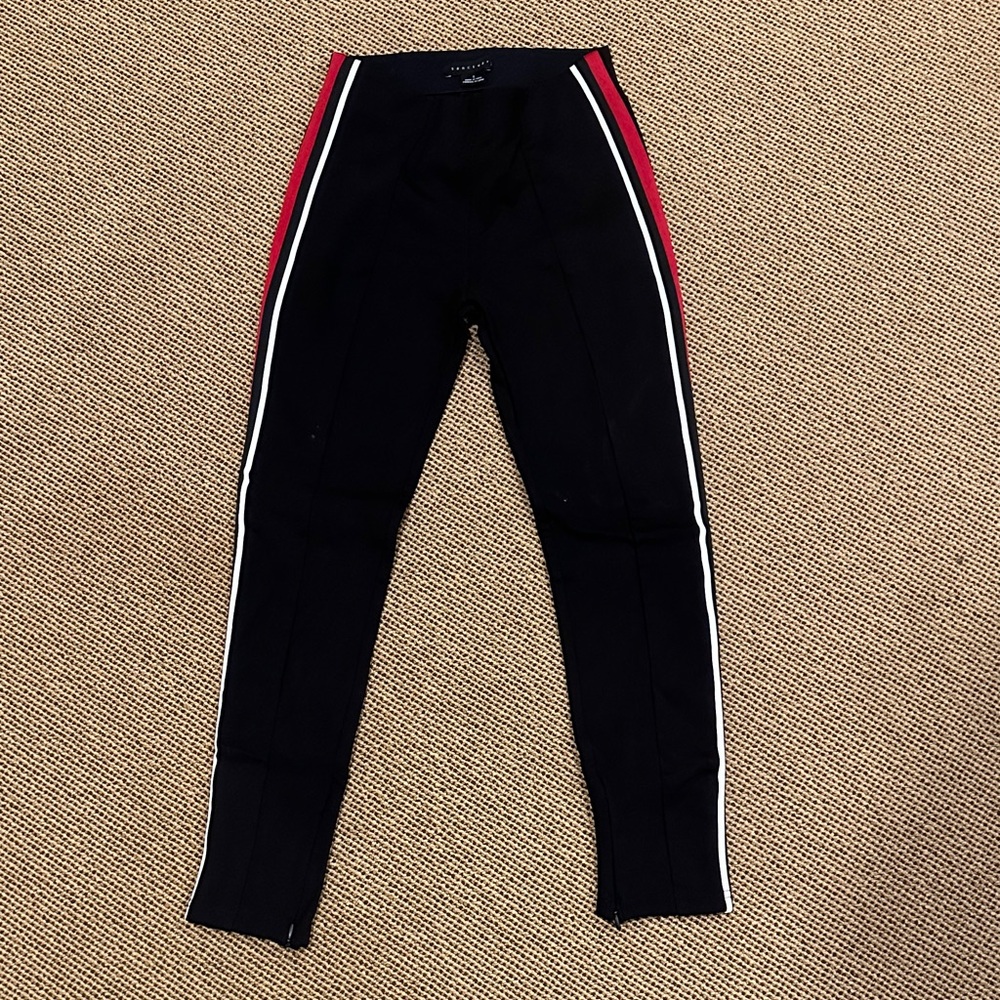 Sanctuary black pant with Red and White Stripes and seam in front